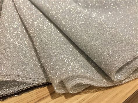 Type of fabric that incorporates a glittering metallic thread 